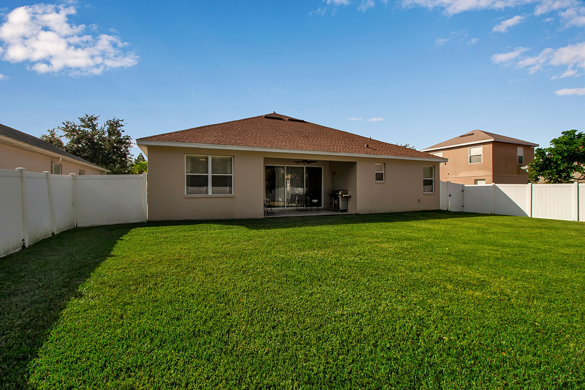6106 34th Court East Bradenton, FL 34203 - Photo 62 of 69 a front view of house with yard and green space
