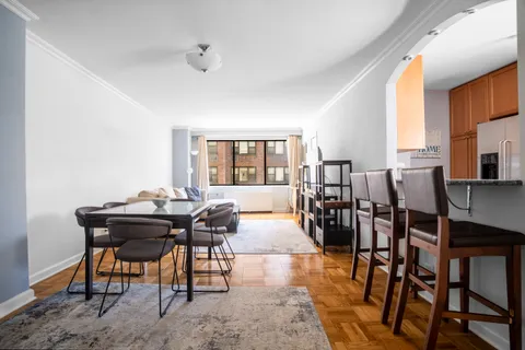 a view of a dining room with furniture
