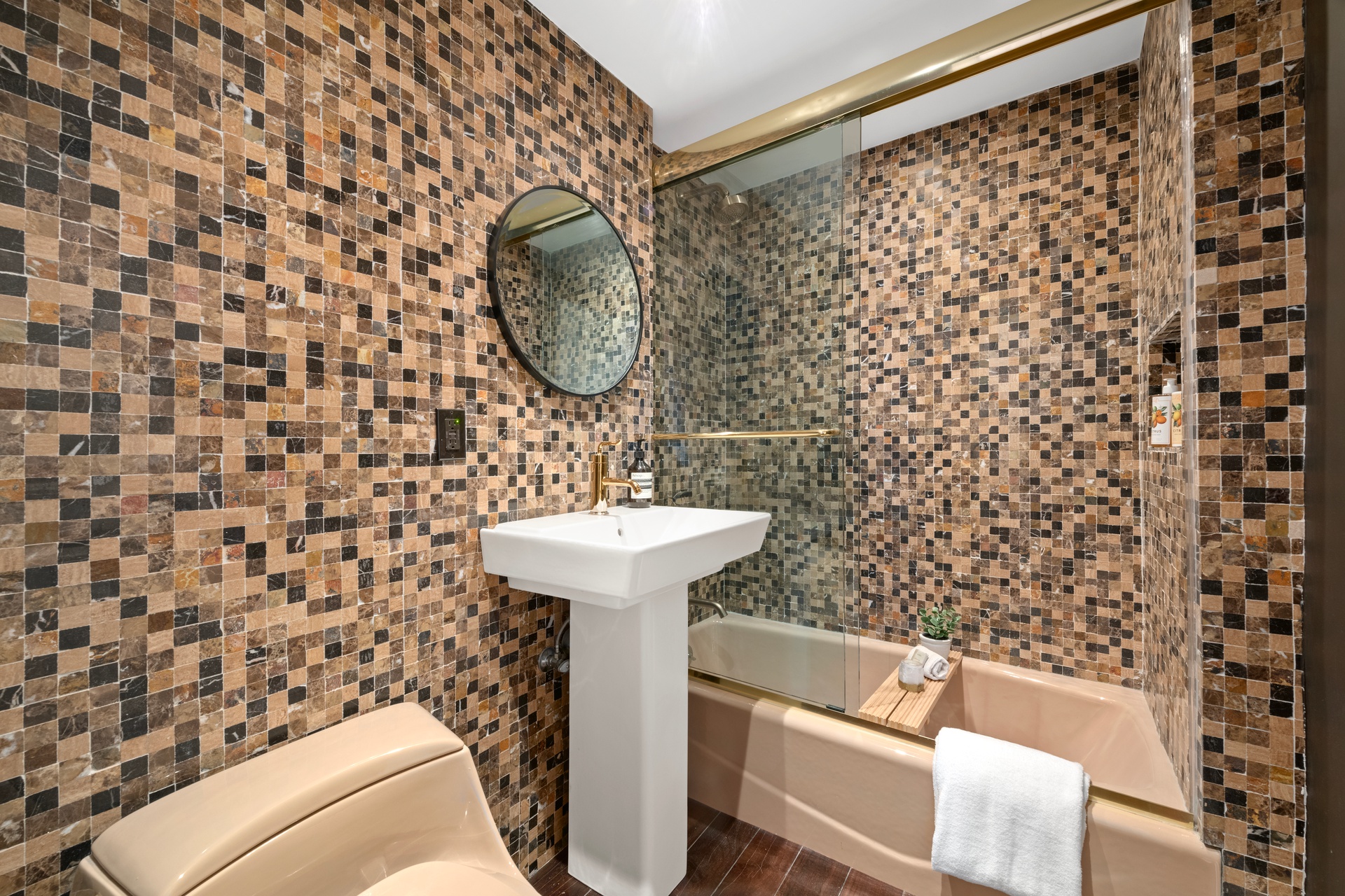 40 East 9th Street, Unit 6M Manhattan, NY 10003 - Photo 8 of 22 a bathroom with a sink toilet and shower