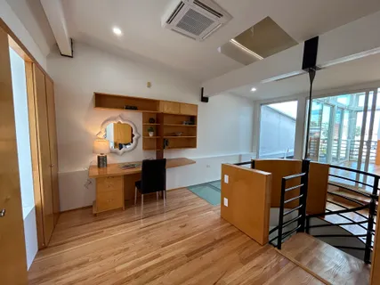 a room with furniture and a window