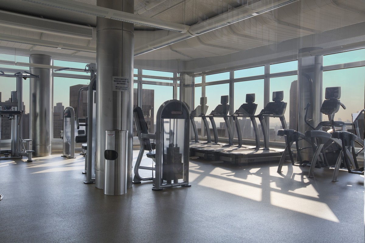 445 5th Avenue, Unit 23D Manhattan, NY 10016 - Photo 10 of 15 a view of a room with gym equipment