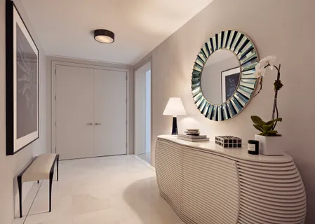 a kitchen with a sink a stove and a lamp