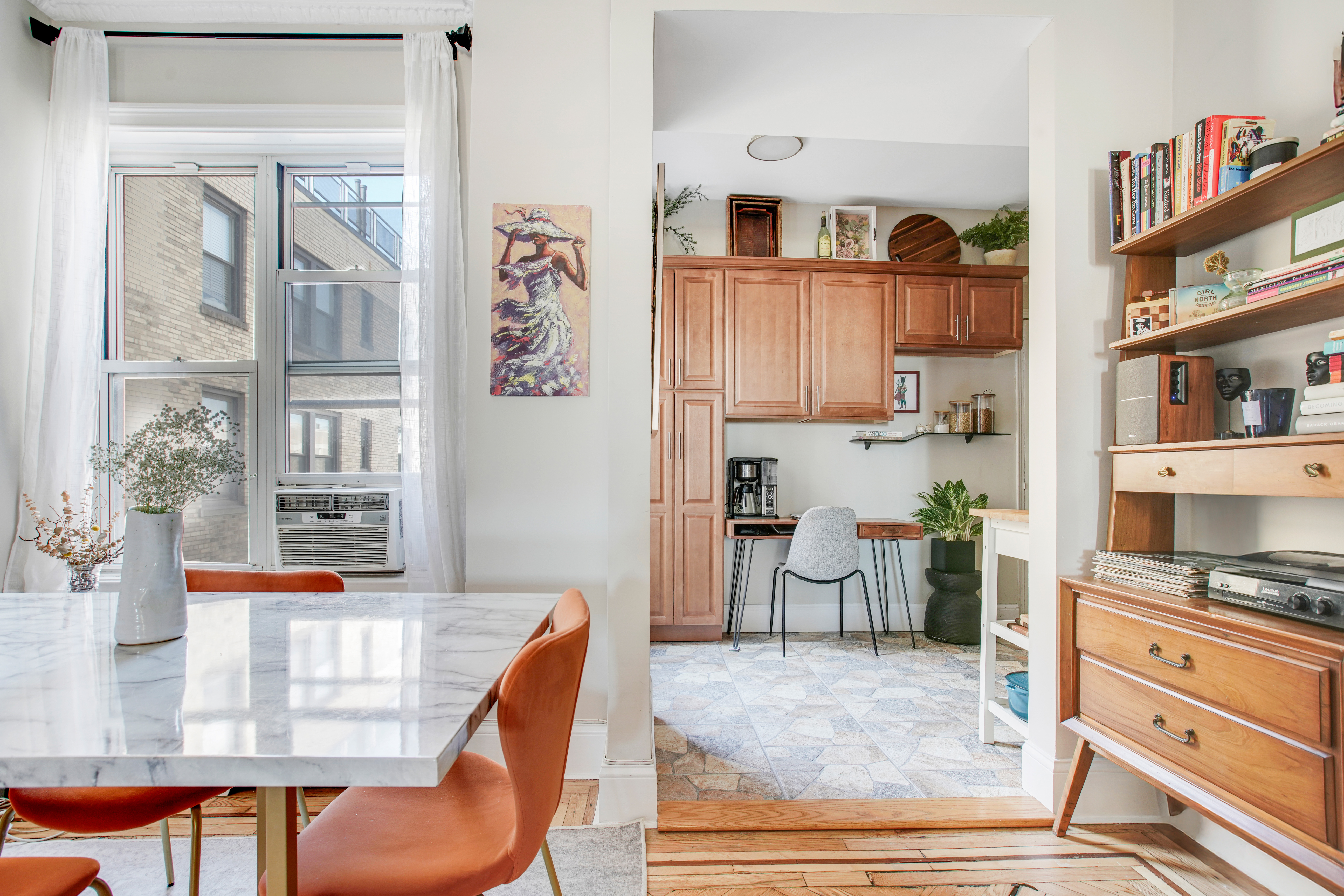 165 West 91st Street, Unit 15B Manhattan, NY 10024 - Photo 2 of 24 a living room with furniture and a kitchen area