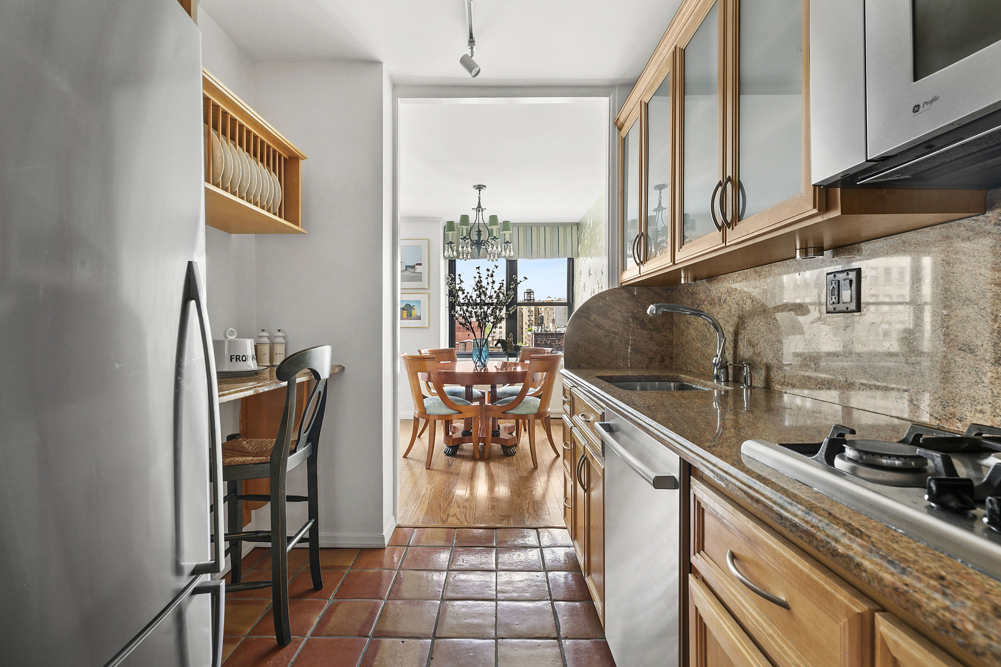 1199 Park Avenue, Unit 10K Manhattan, NY 10128 - Photo 5 of 12 a view of living room with furniture and a window