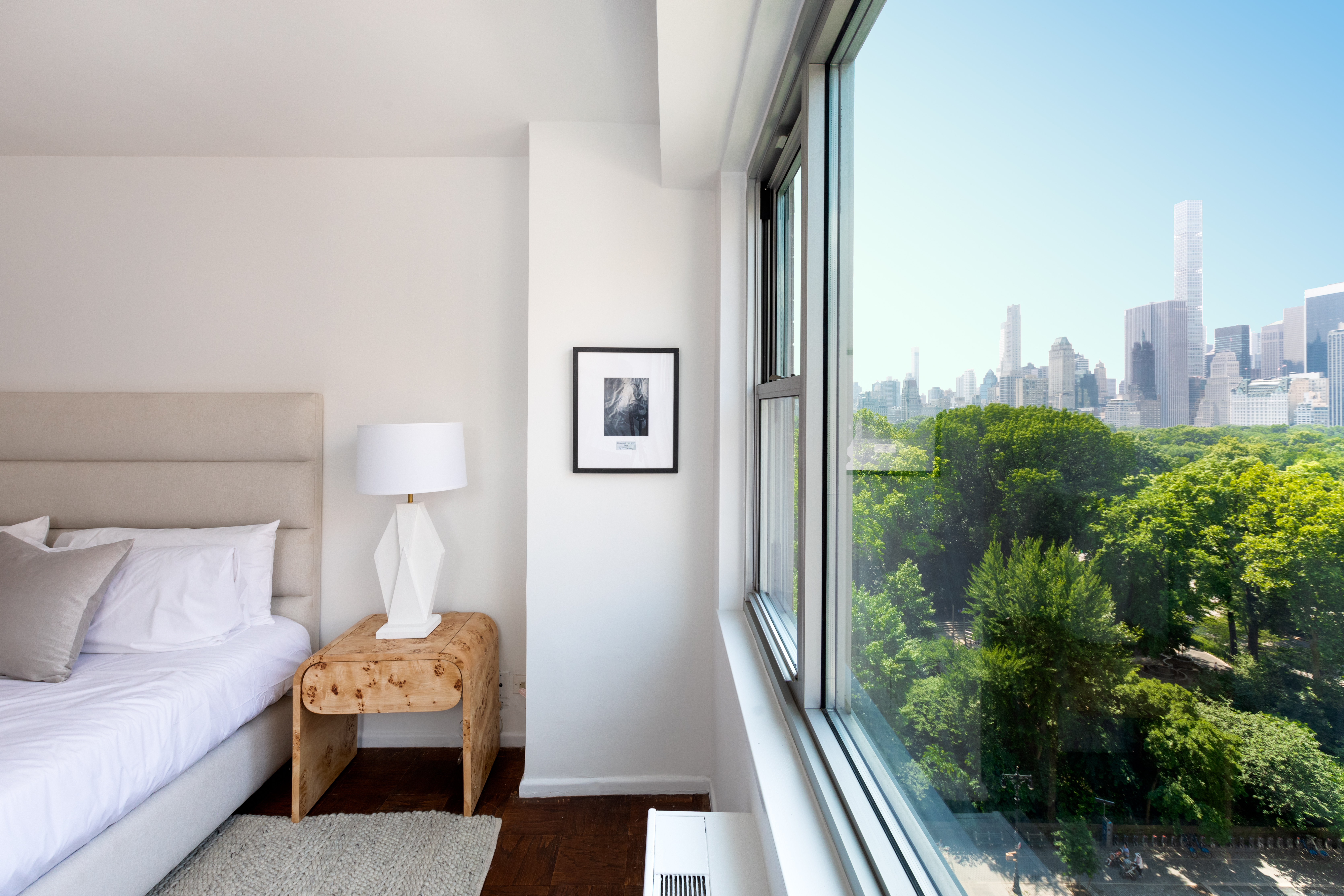 80 Central Park West, Unit 12C Manhattan, NY 10023 - Photo 12 of 27 a bedroom with furniture and a potted plant