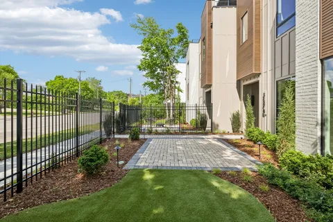 a view of a garden with a pathway