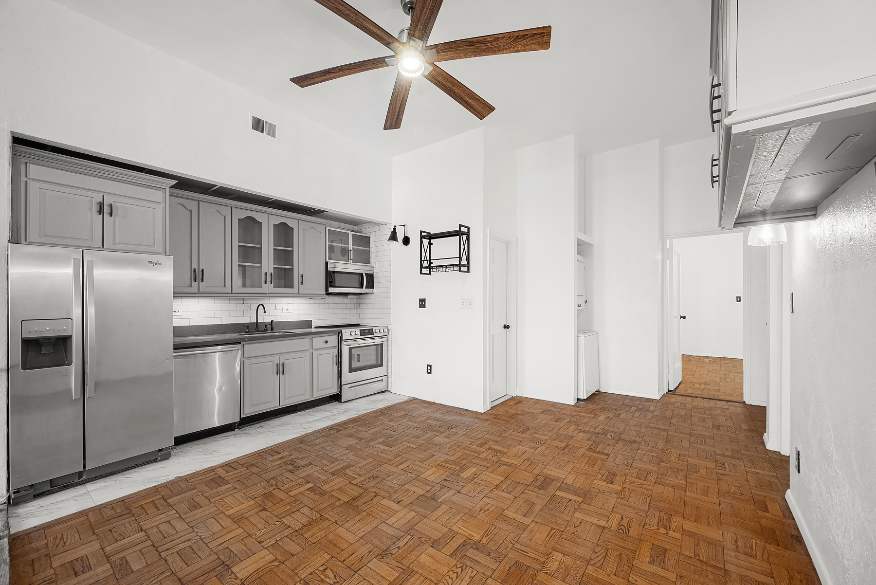 862 West End Avenue, Unit GARDEN Manhattan, NY 10025 - Photo 2 of 13 a kitchen with stainless steel appliances a refrigerator and a stove
