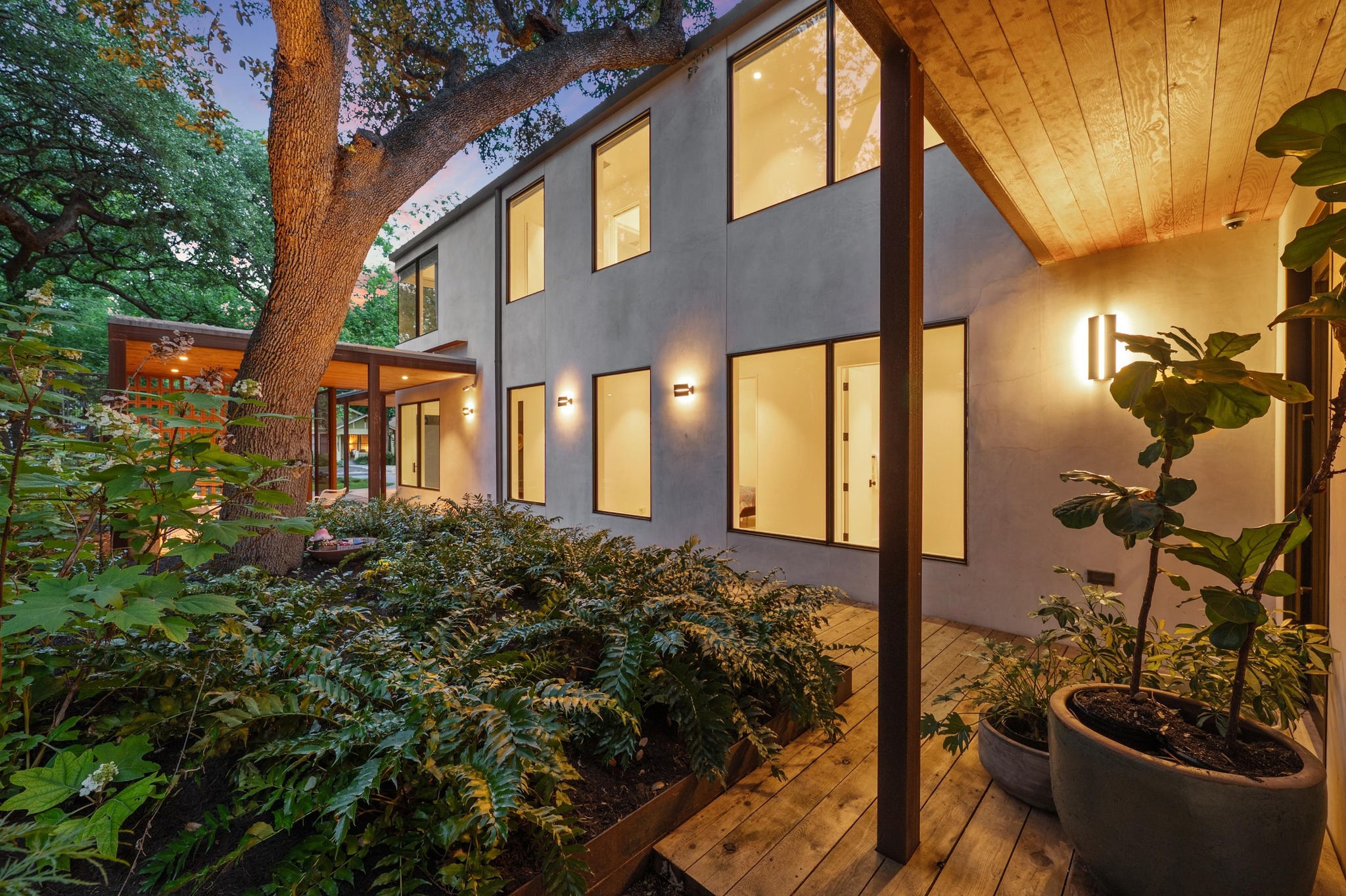 1206 Bickler Road Austin, TX 78704 - Photo 11 of 65 a front view of a house with a garden