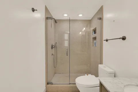 a bedroom with a bed and furniture