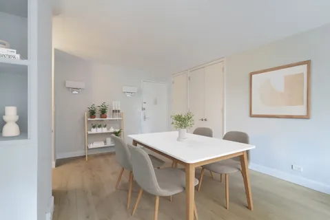 a view of a dining room with furniture