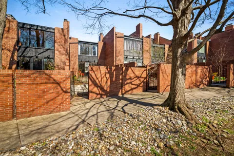 a view of a building with a yard