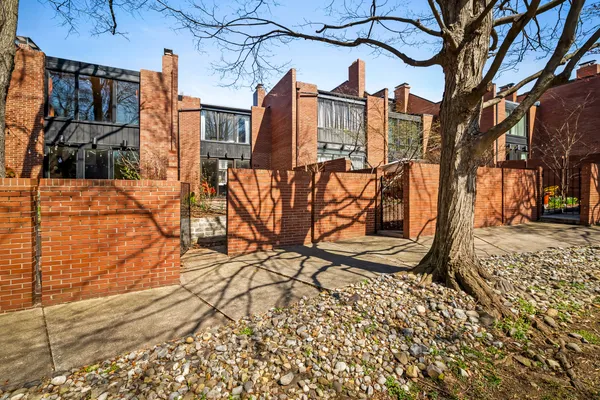 a view of a building with a yard