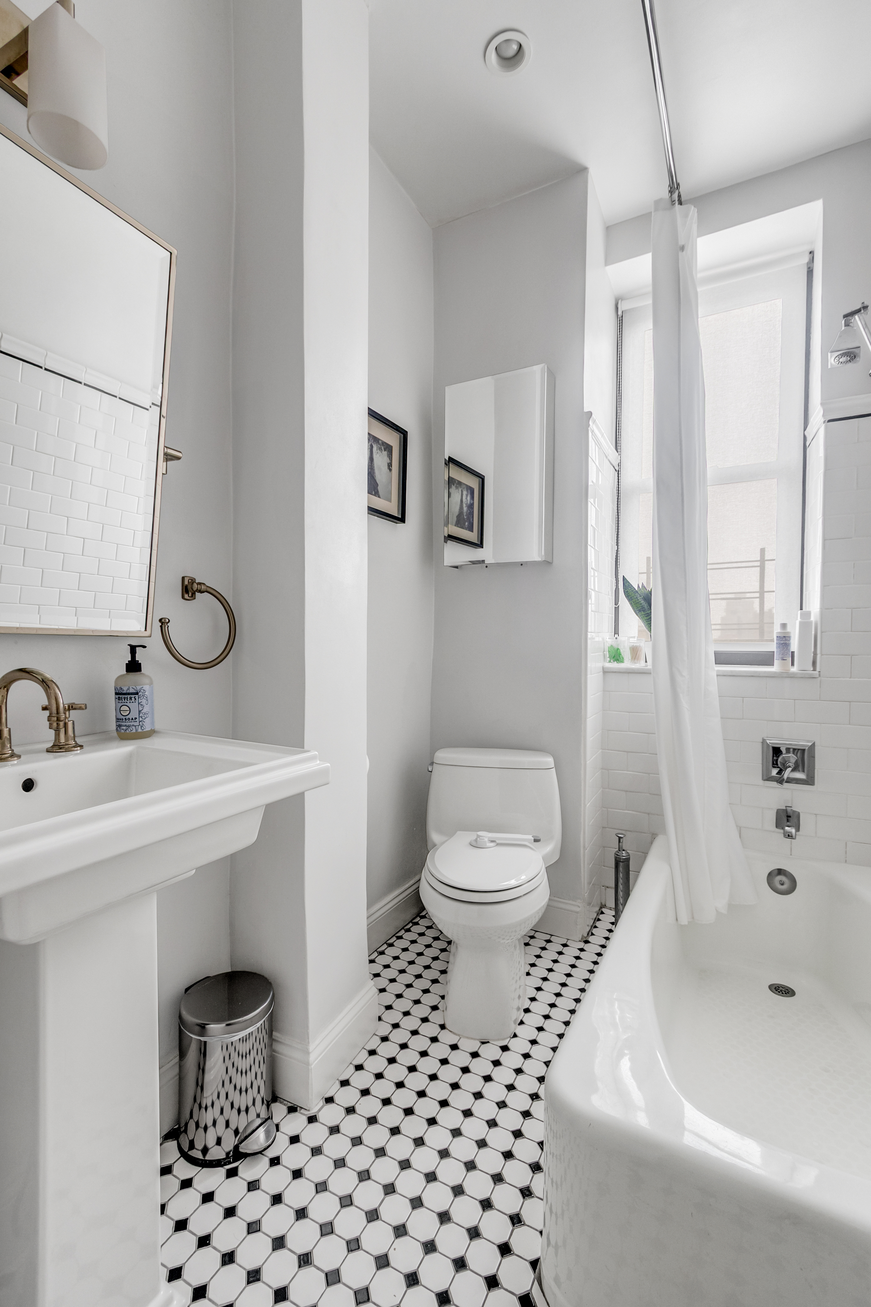 51 West 81st Street, Unit 9D Manhattan, NY 10024 - Photo 9 of 15 a bathroom with a sink toilet and shower