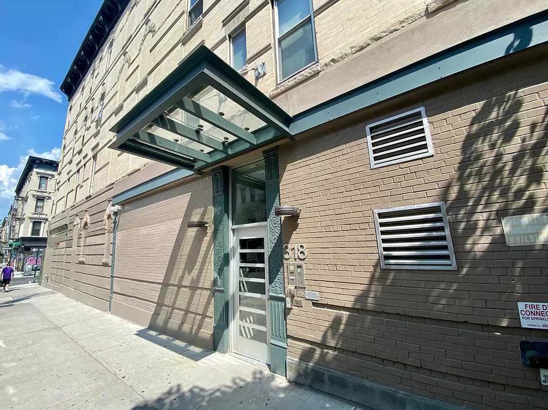 318 Knickerbocker Avenue, Unit 3D Brooklyn, NY 11237 - Photo 9 of 14 a view of entryway with a wooden wall
