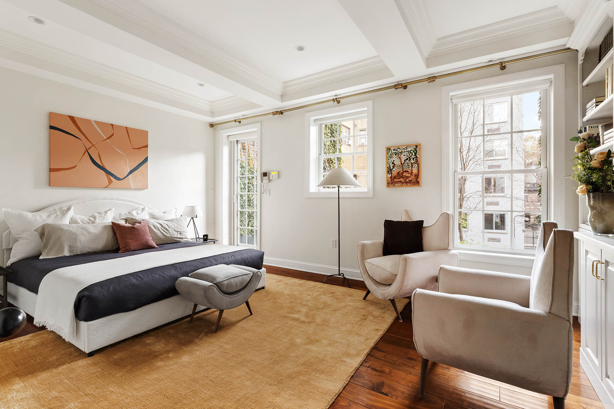 12 Leroy Street Manhattan, NY 10014 - Photo 8 of 20 a bedroom with furniture and a fireplace