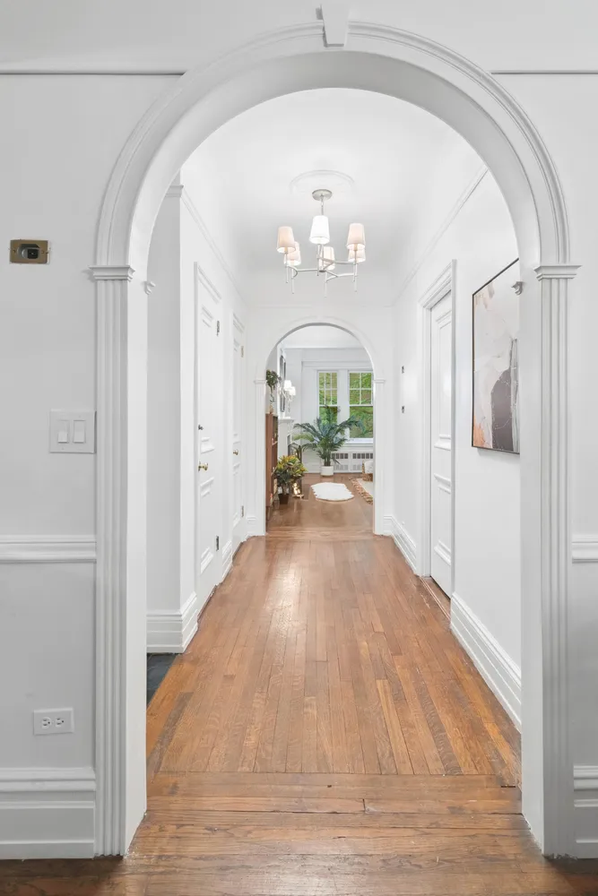 a view of a hallway view with staircase