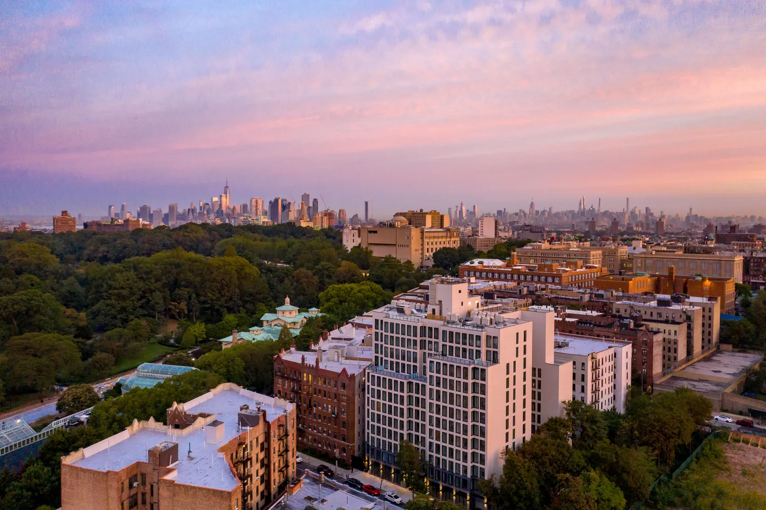 a view of a city with tall buildings
