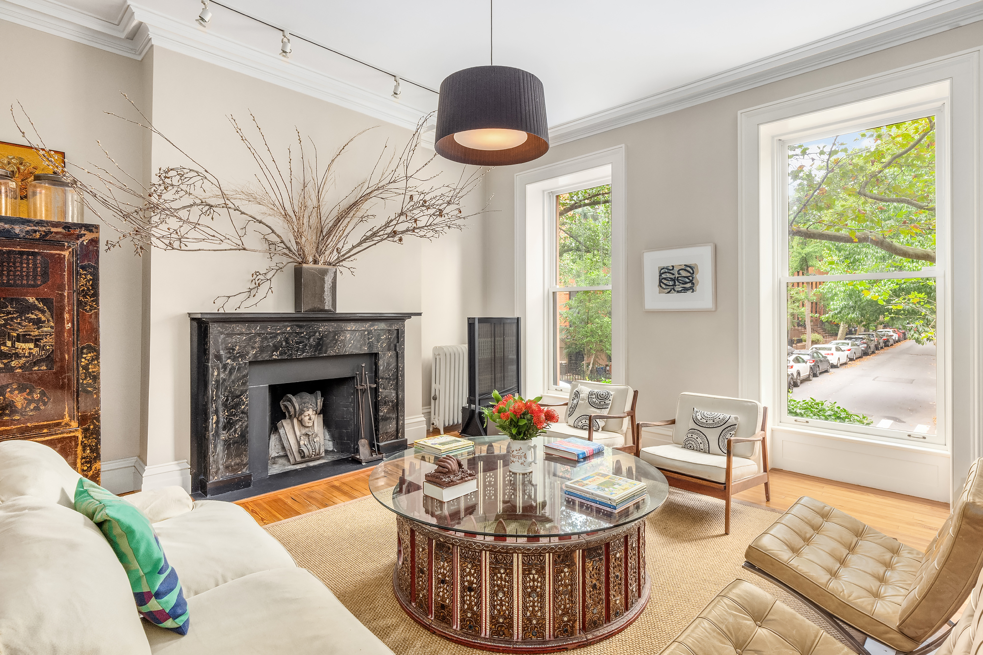 128 State Street, Unit 2 Brooklyn, NY 11201 - Photo 2 of 15 a living room with furniture and a fireplace