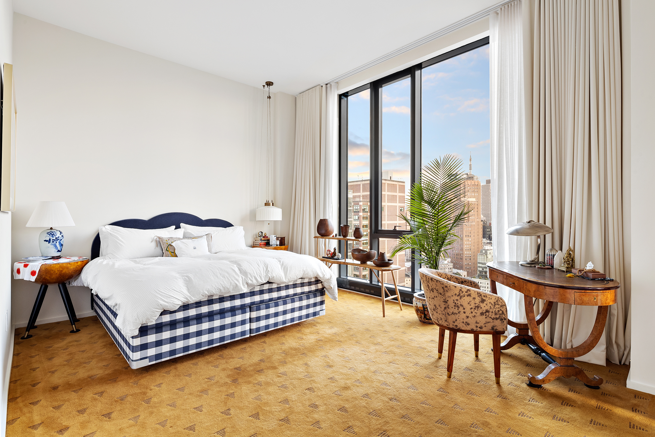 570 Broome Street, Unit PHA Manhattan, NY 10013 - Photo 8 of 22 a bedroom with a bed and a window