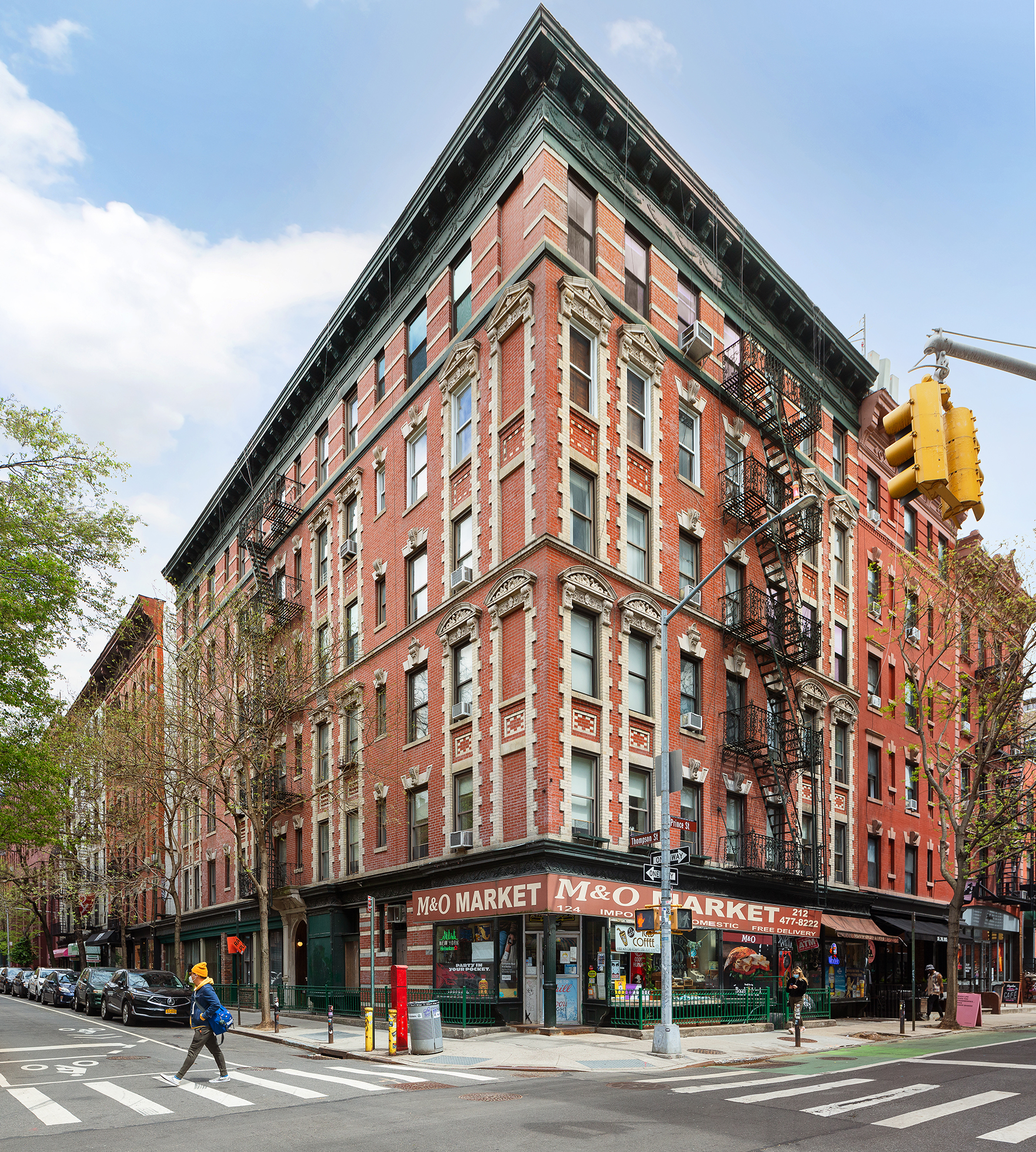 124 Thompson Street, Unit 24 Manhattan, NY 10012 - Photo 9 of 10 a view of a building and a street