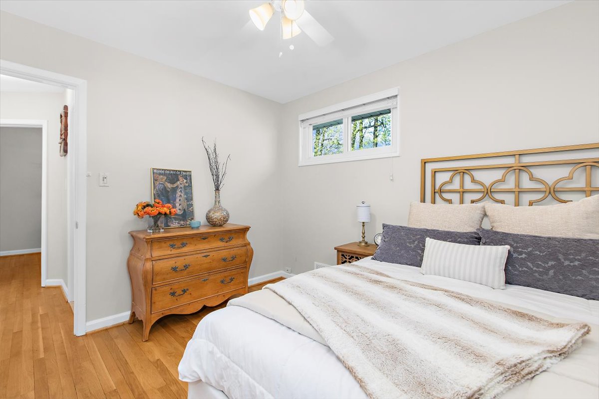 12712 Atherton Drive Silver Spring, MD 20906 - Photo 18 of 40 a bedroom with two beds and a dresser