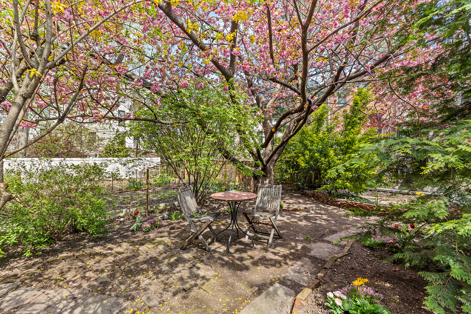 417 6th Street Brooklyn, NY 11215 - Photo 8 of 21 a view of a bench in backyard