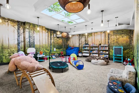 a room with furniture and a large window