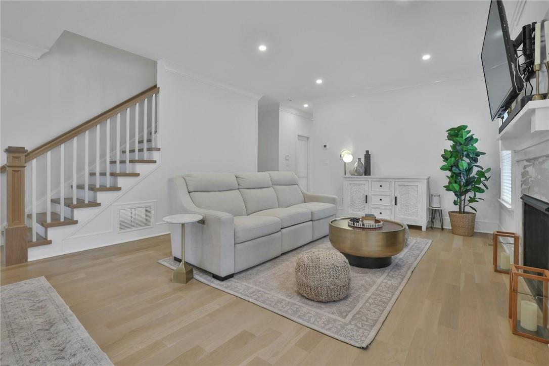 211 Purchase Street, Unit A Rye, NY 10580 - Photo 7 of 22 a living room with furniture and a potted plant