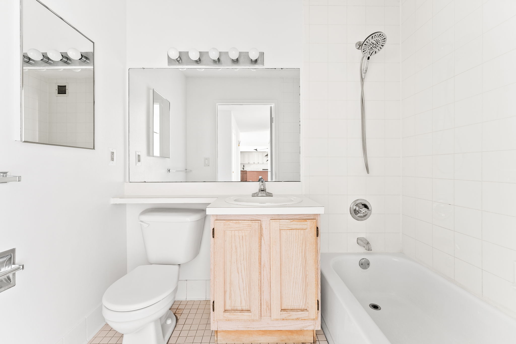 1919 Madison Avenue, Unit 214 Manhattan, NY 10035 - Photo 9 of 19 a bathroom with a sink a toilet and a bathtub