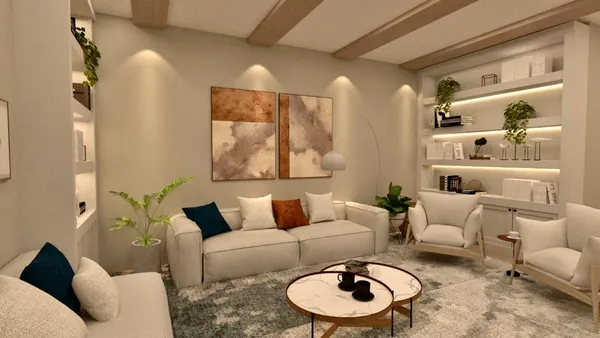 a living room with furniture and a wooden floor