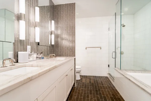 a bathroom with a sink and a shower