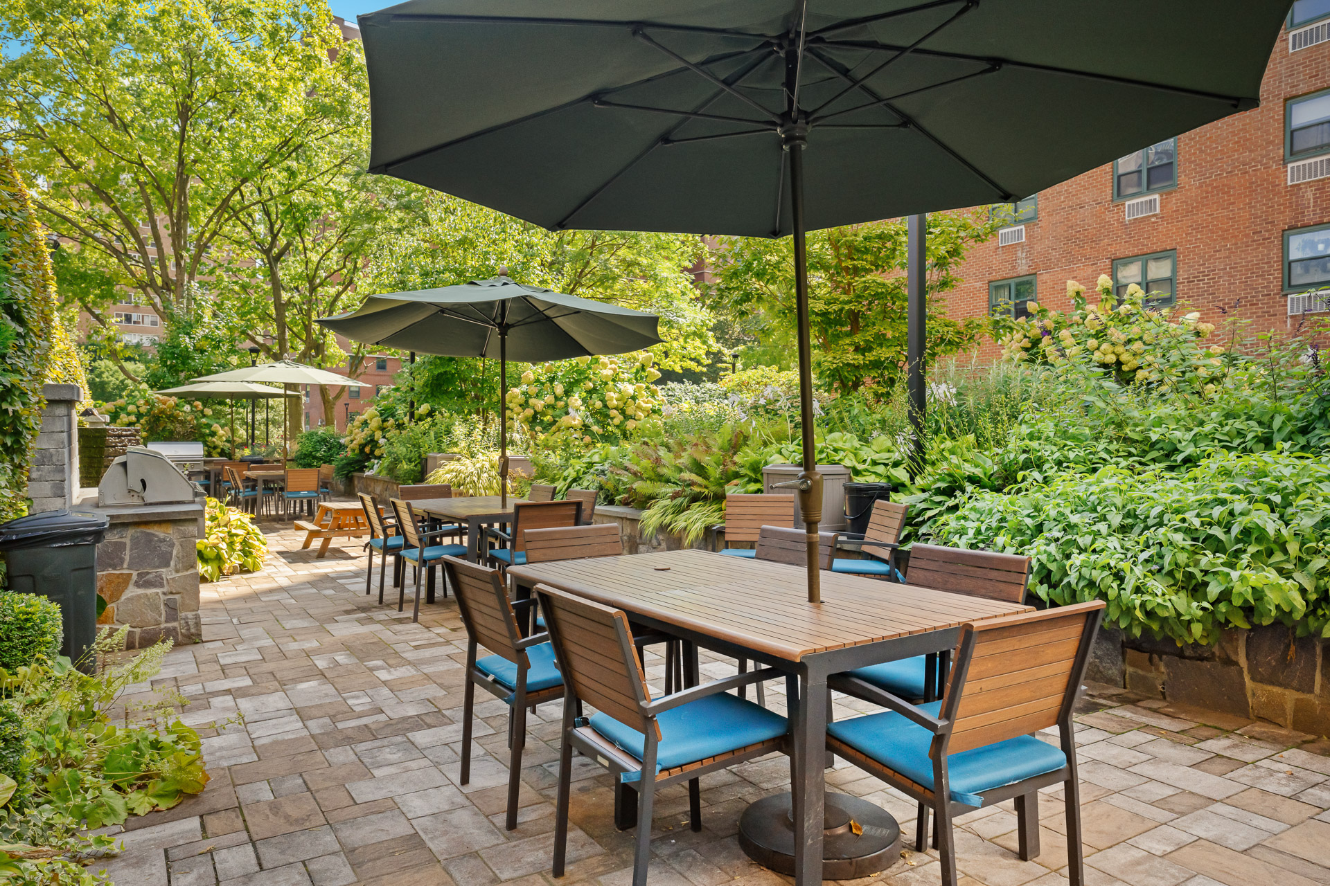 175 Willoughby Street, Unit 6F Brooklyn, NY 11201 - Photo 8 of 11 a view of an outdoor sitting area with chairs and umbrella