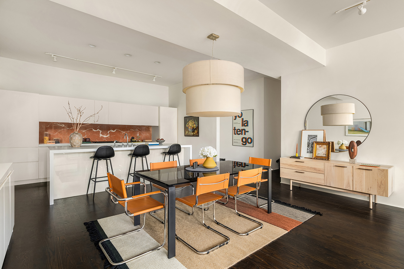 252 7th Avenue, Unit 14G Manhattan, NY 10001 - Photo 2 of 20 a living room with fireplace furniture and a wooden floor