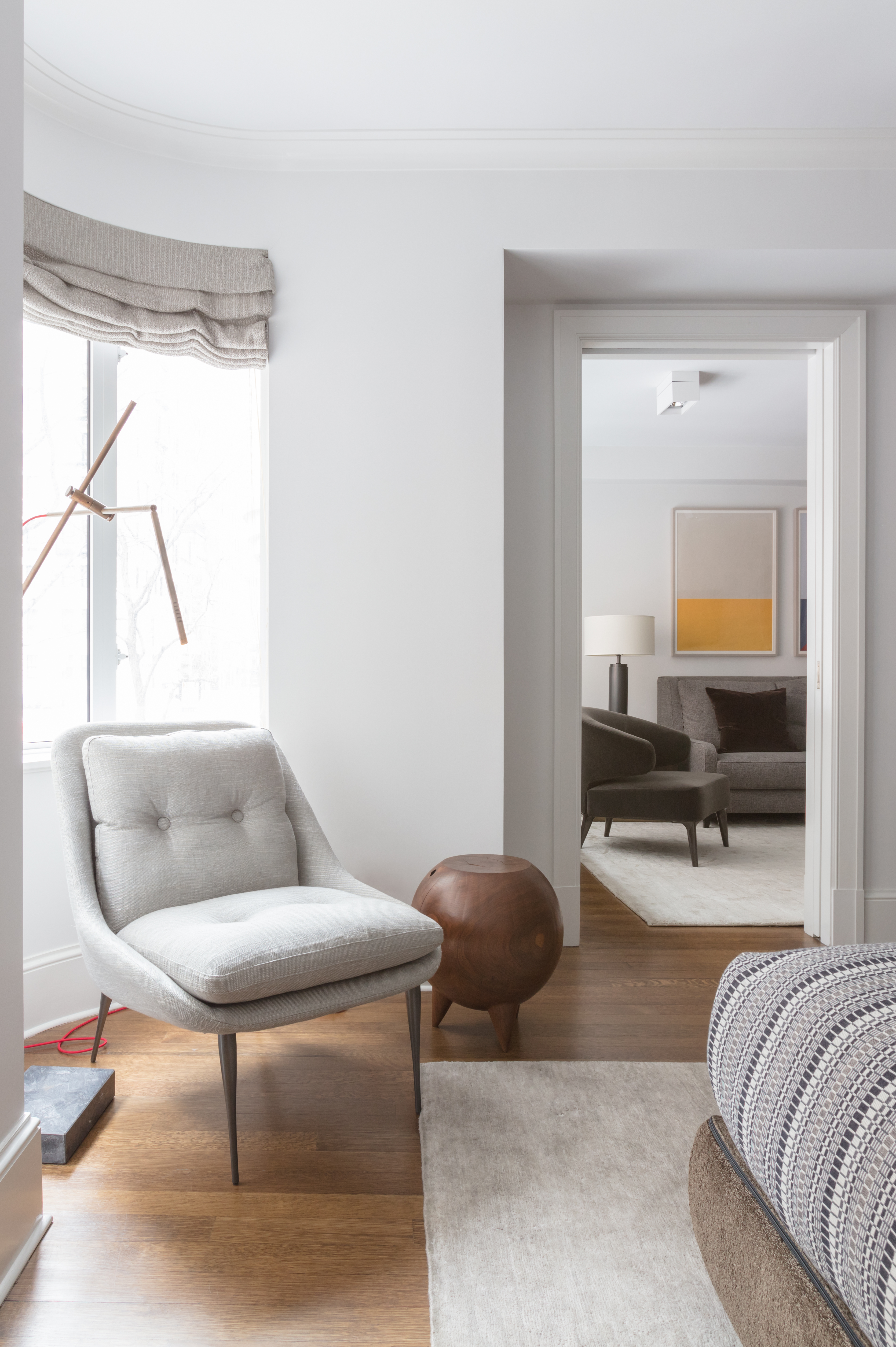 530 Park Avenue, Unit 2F Manhattan, NY 10065 - Photo 12 of 19 a living room with furniture and a window