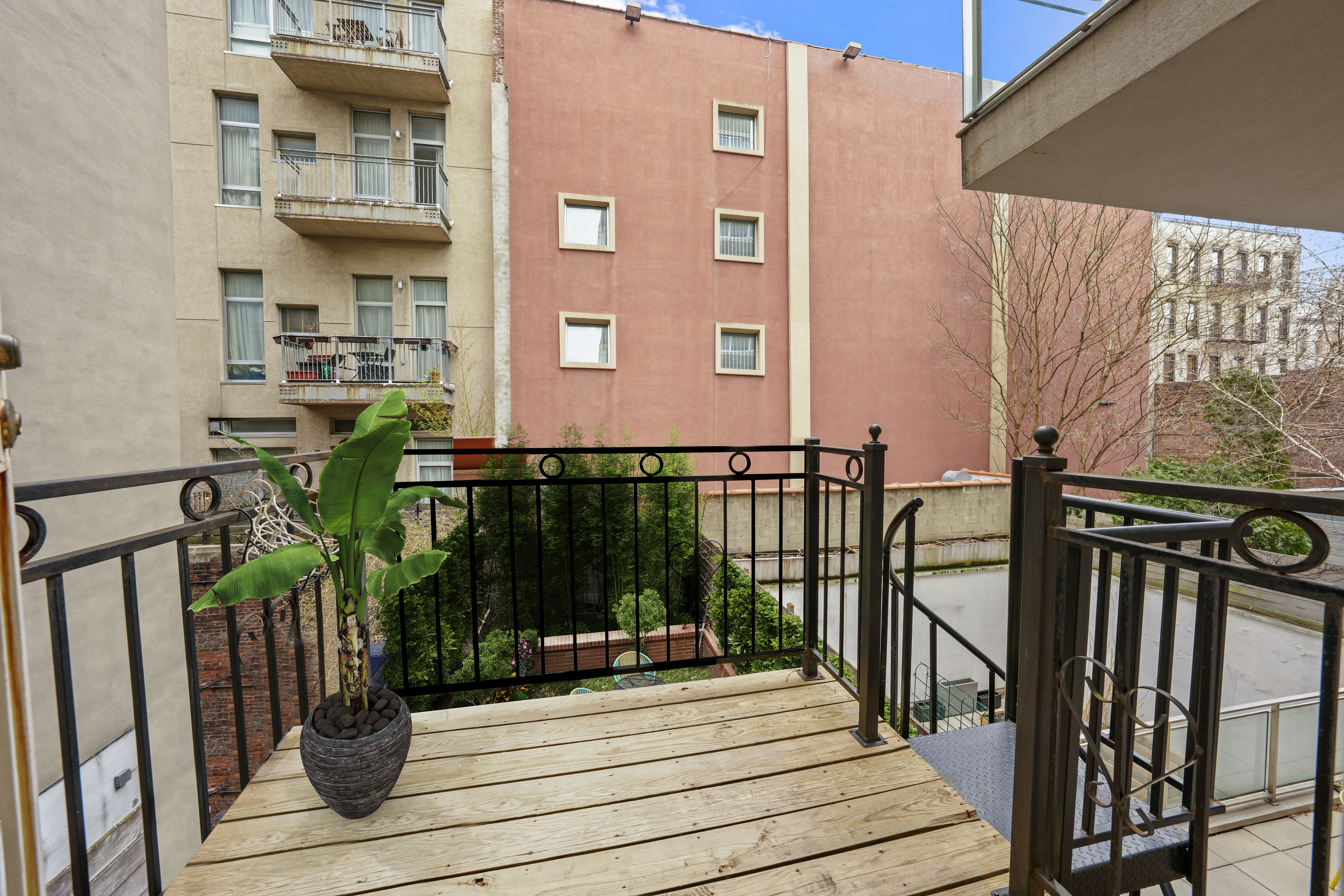 133 West 123rd Street Manhattan, NY 10027 - Photo 28 of 31 a view of a balcony with chairs
