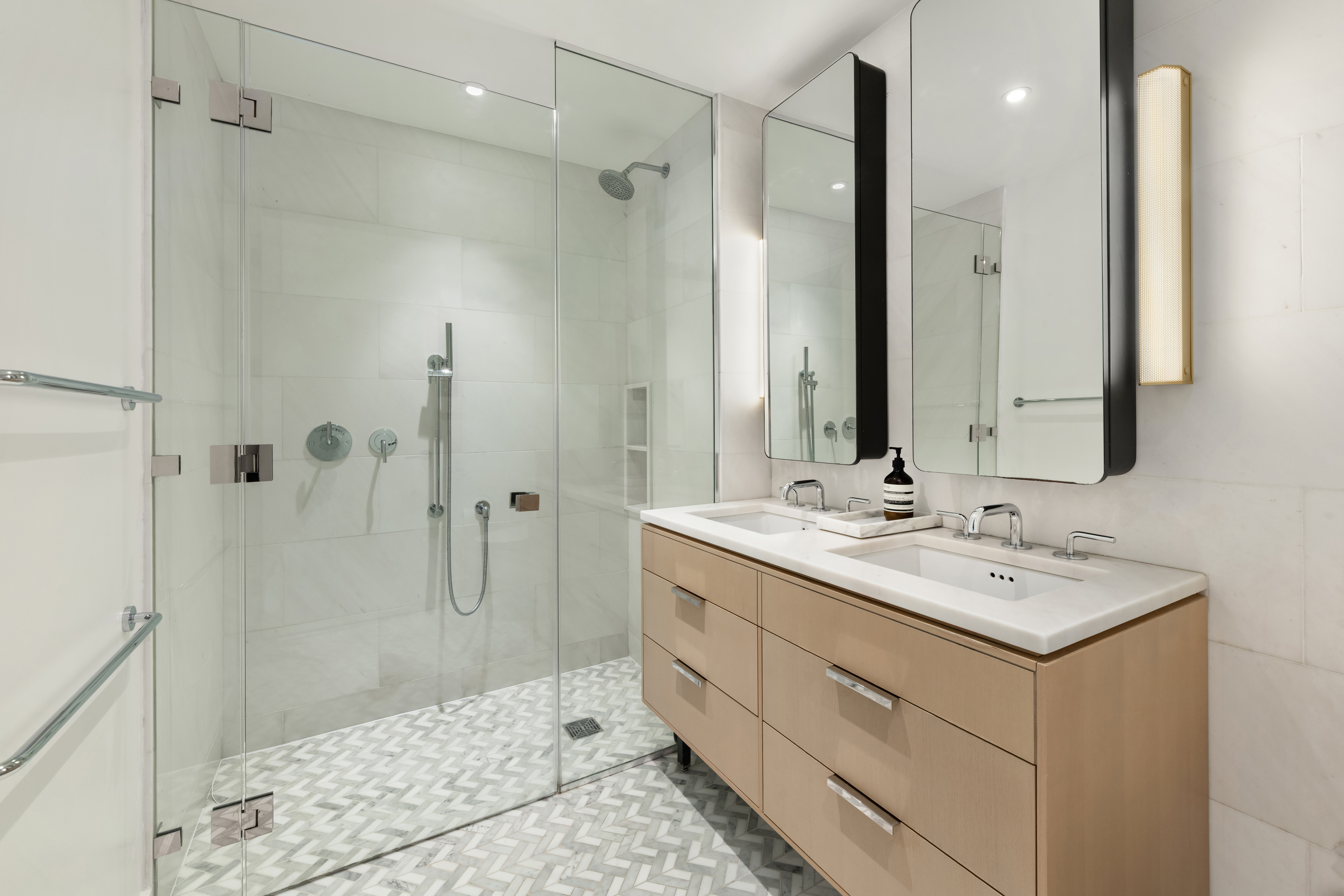 181 18th Street, Unit 214 Brooklyn, NY 11215 - Photo 5 of 16 a bathroom with a shower sink and mirror