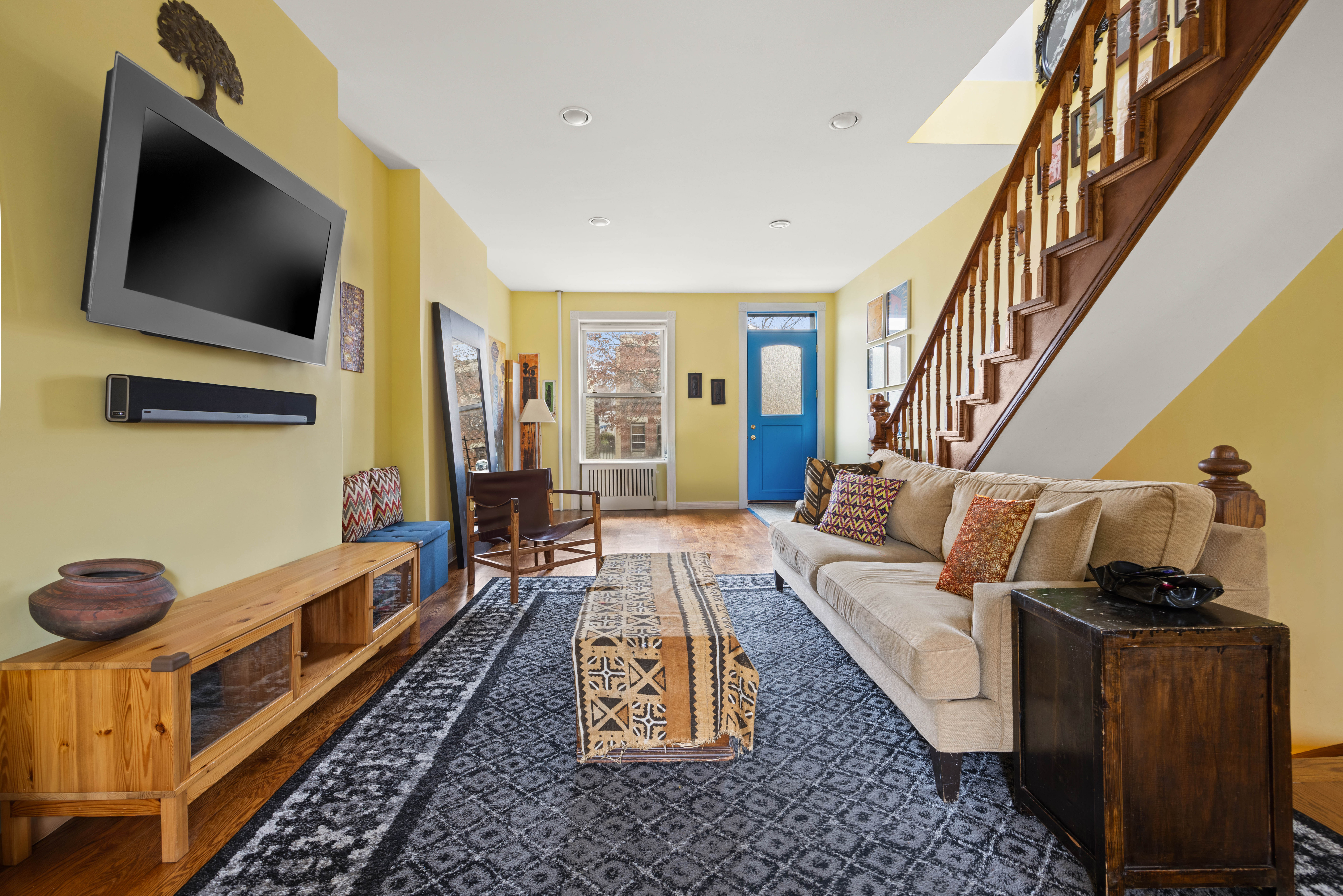 11A Dewey Place Brooklyn, NY 11233 - Photo 2 of 12 a living room with furniture and a flat screen tv