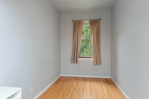 a view of a room that has a window