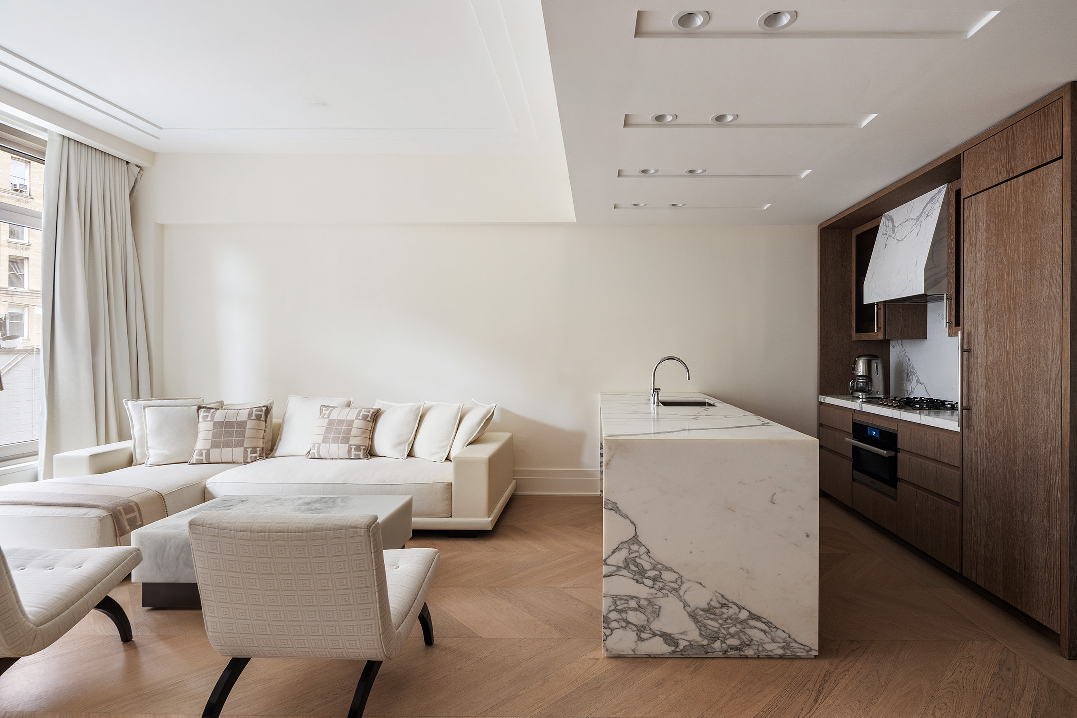 40 Bleecker Street, Unit 3E Manhattan, NY 10012 - Photo 2 of 12 a living room with furniture and window