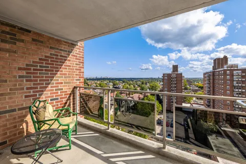 a view of a city from a balcony