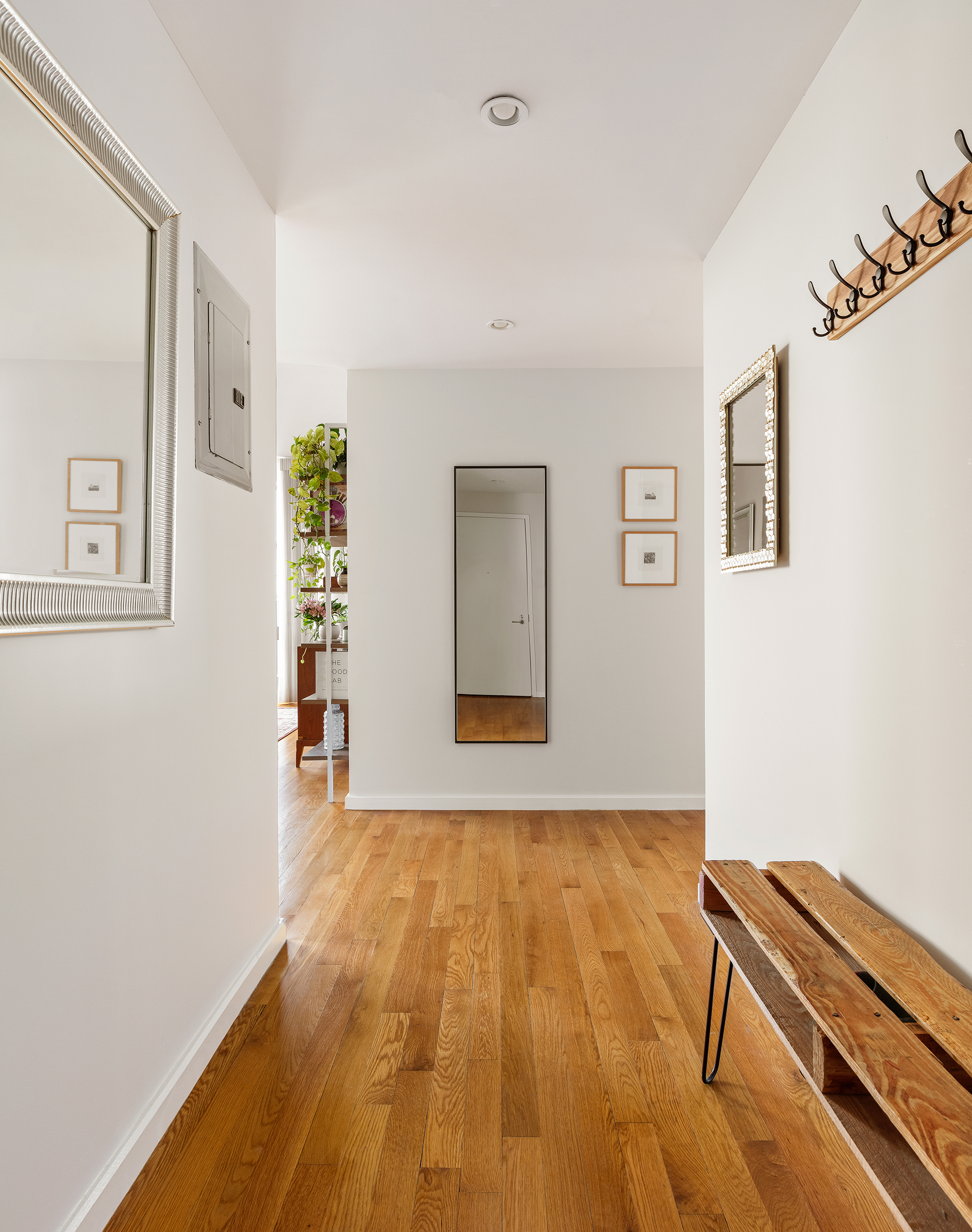 82 Irving Place, Unit 7C Brooklyn, NY 11238 - Photo 11 of 16 a view of an empty room with window and wooden floor