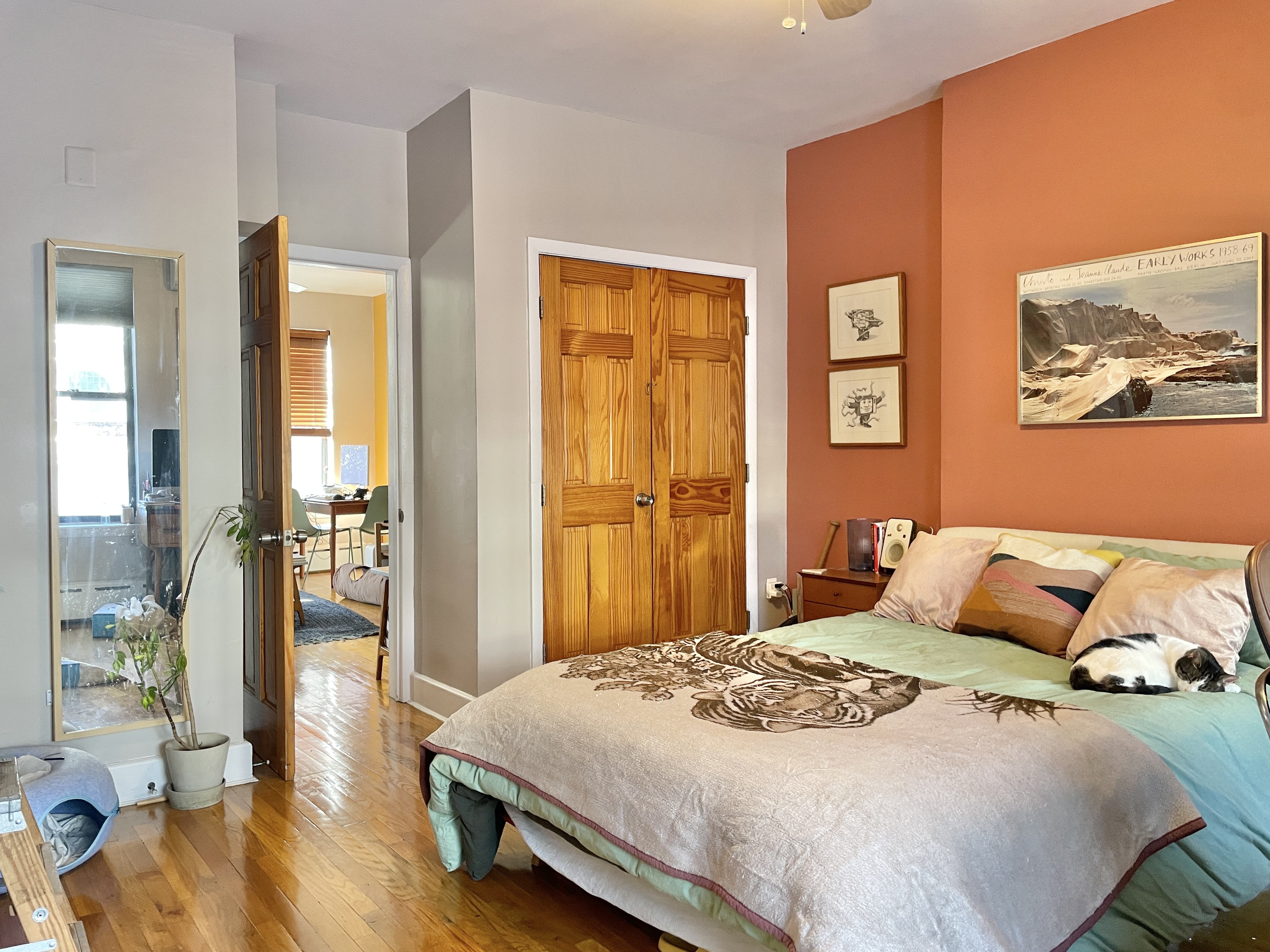 999 Fulton Street, Unit 2 Brooklyn, NY 11238 - Photo 7 of 10 a bedroom with a bed and wooden floor