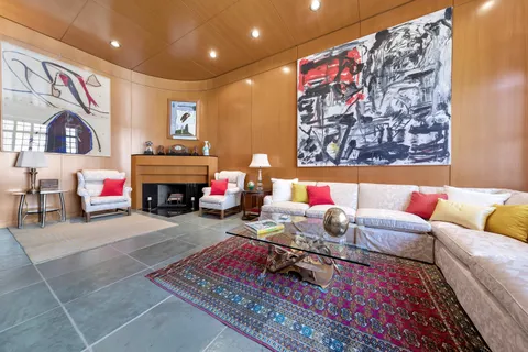 a living room with furniture and a couch