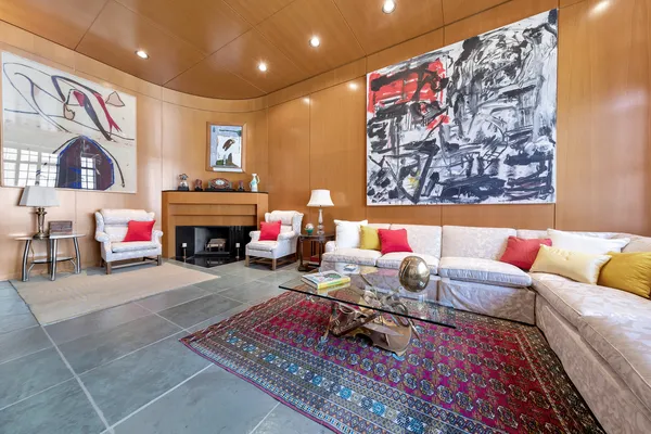 a living room with furniture and a couch