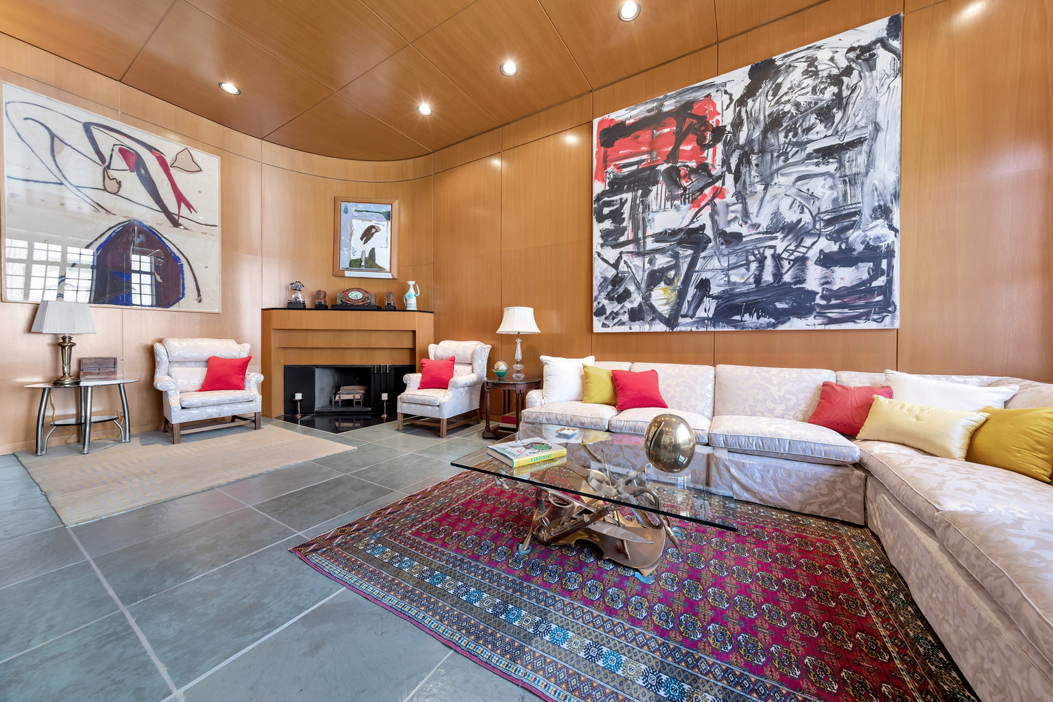 50 East 77th Street, Unit 8C Manhattan, NY 10075 - Photo 3 of 14 a living room with furniture and a couch