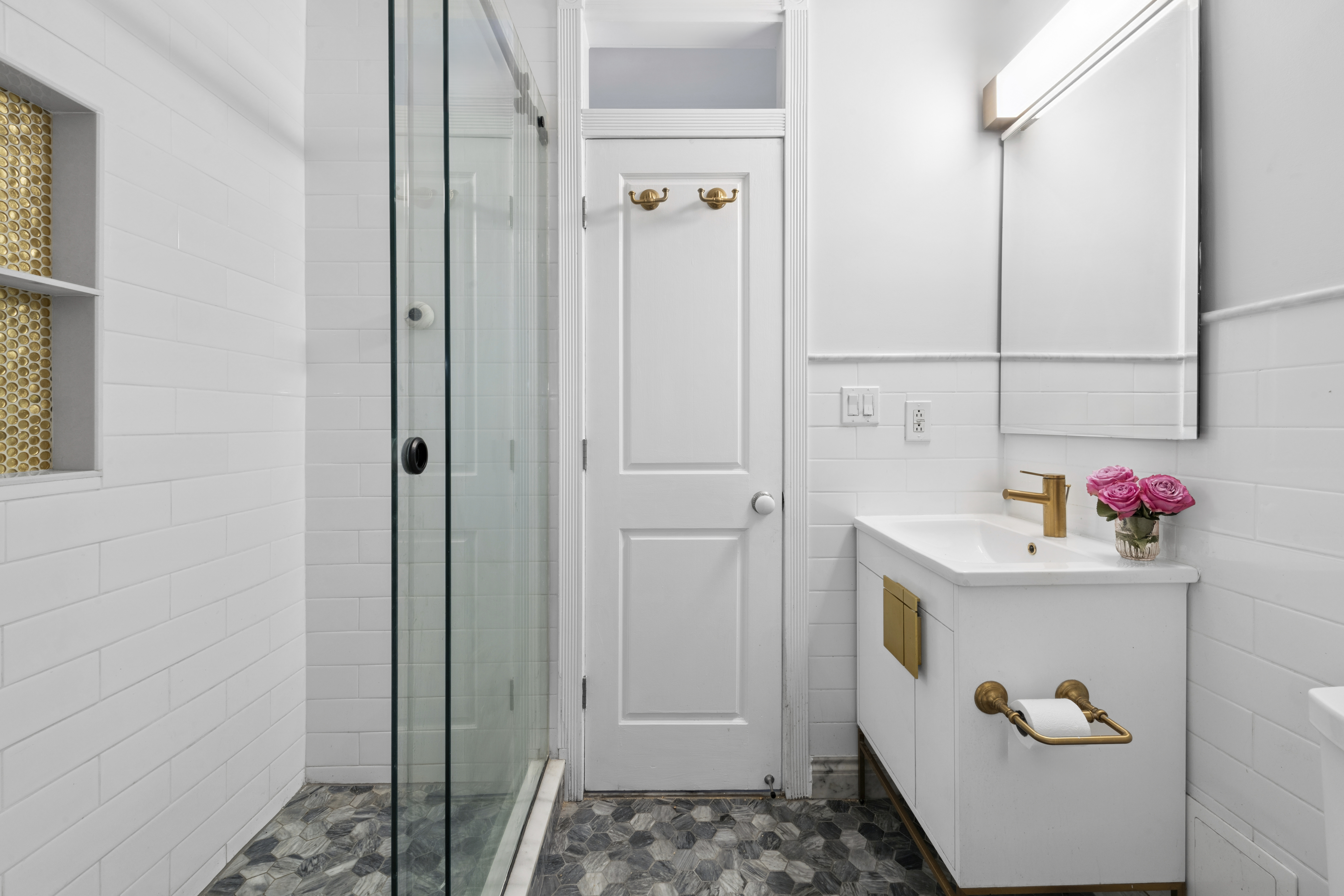 350 East 62nd Street, Unit PHD Manhattan, NY 10065 - Photo 13 of 15 a bathroom with a tub and shower
