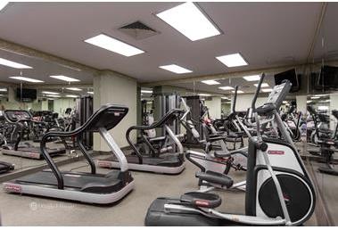 22 West 15th Street, Unit 19D Manhattan, NY 10011 - Photo 15 of 18 a view of a room with gym equipment