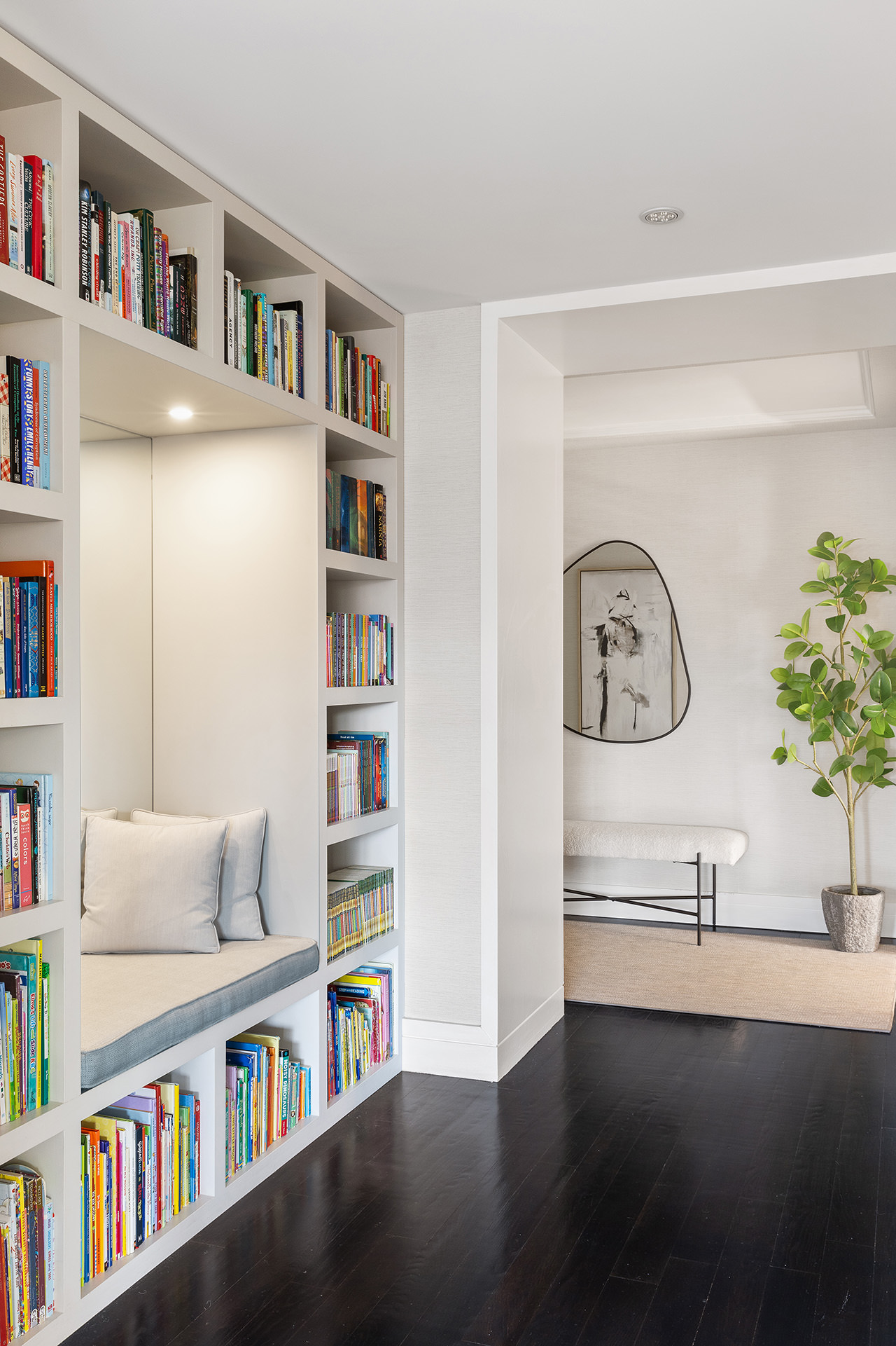 101 West 12th Street, Unit 8RS Manhattan, NY 10011 - Photo 11 of 19 a view of a bedroom with furniture and book shelf