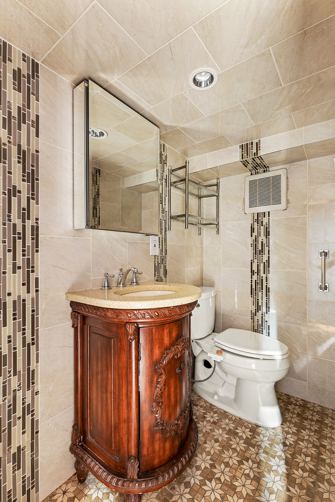 570 19th Street Brooklyn, NY 11218 - Photo 10 of 13 a bathroom with a granite countertop sink toilet and shower