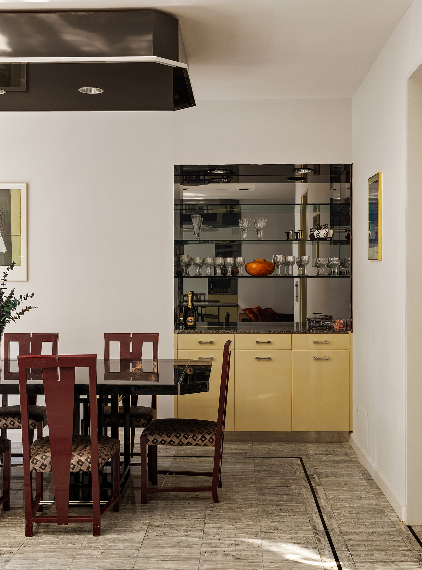 415 East 54th Street, Unit 2A Manhattan, NY 10022 - Photo 5 of 16 a kitchen with stainless steel appliances a refrigerator and cabinets